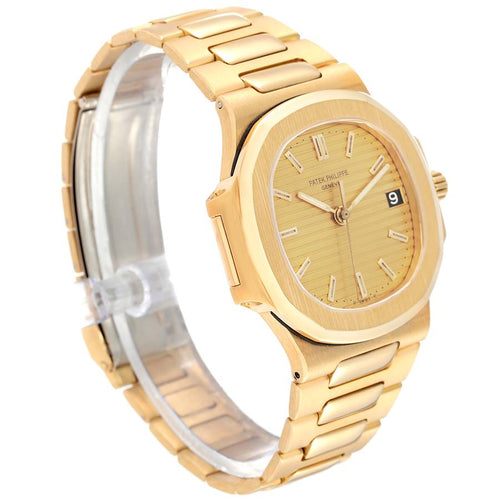 PATEK PHILIPPE  Patek Philippe Nautilus Watch in yellow golden Ref:  4700 Ref: 4700 Circa 1981  Collector Square Ref:
