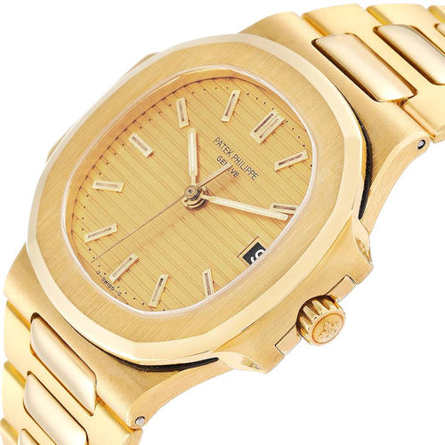 PATEK PHILIPPE  Patek Philippe Nautilus Watch in yellow golden Ref:  4700 Ref: 4700 Circa 1981  Collector Square Ref: